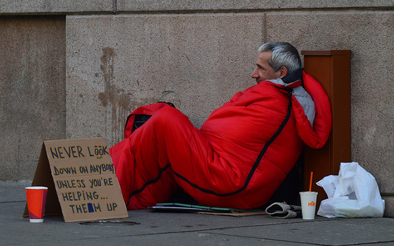 A homeless man sleeping rough