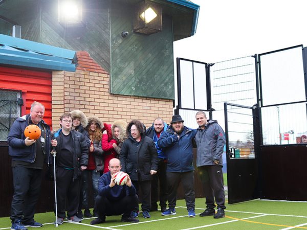 Members of Daisy Inclusive UK with their new floodlights