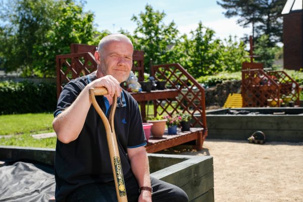 Alt Bank House resident Kenny Sheridan at the hostel's allotment 