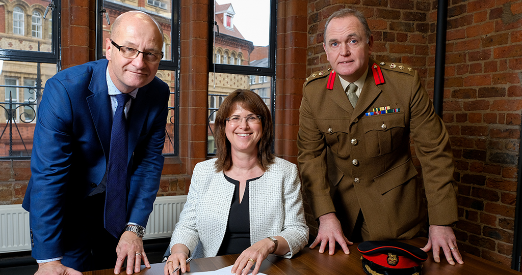 Onward chief executive Bronwen Rapley signs the Armed Forces Covenant 