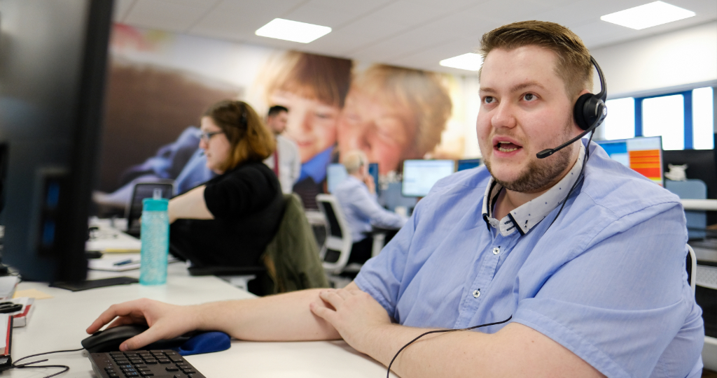 Contact Centre team member taking a call 